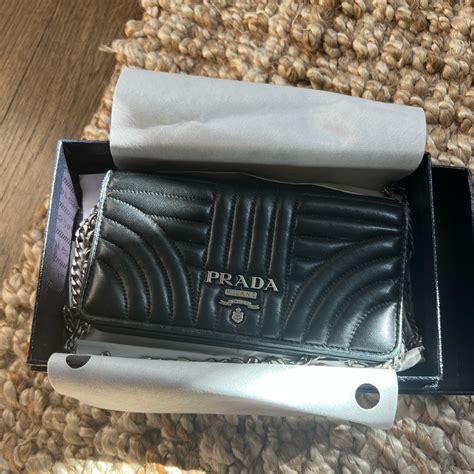 prada diagramme impunture leather chain wallet|Pre.